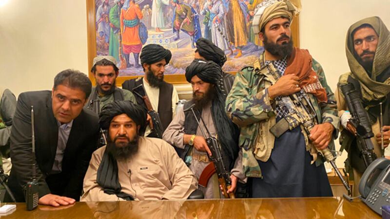 Taliban fighters take control of Afghan presidential palace after the Afghan President Ashraf...