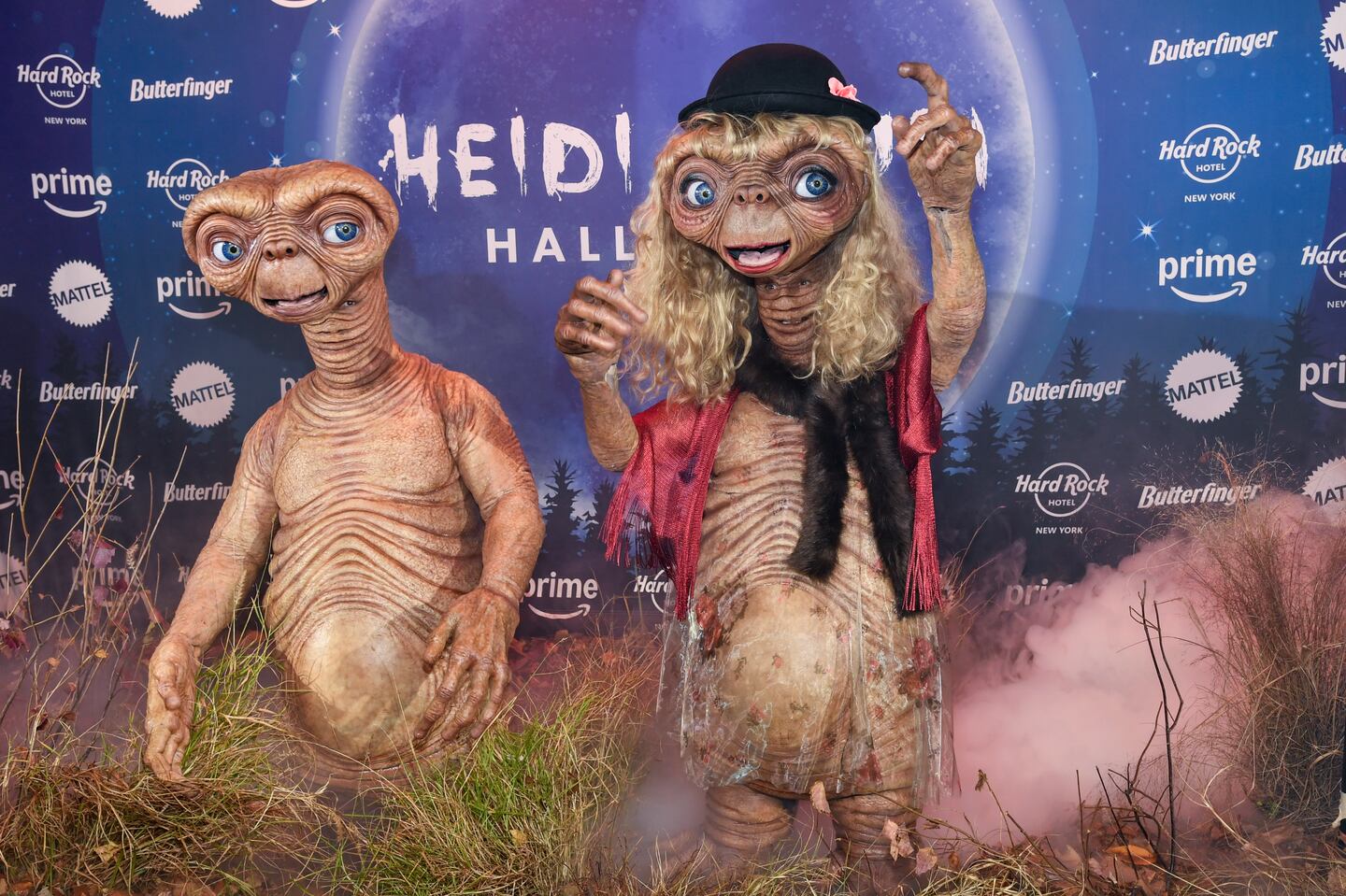 Heidi Klum and Janelle Monáe wear elaborate E.T. costumes for their Halloween parties WLTZ
